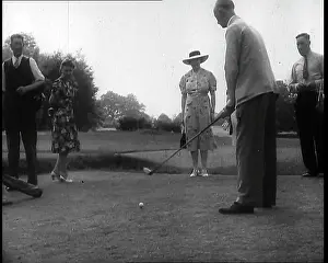 Links: Men and Women at the Golf Links With One Man