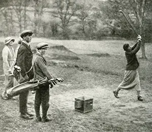 Beaconsfield: Men and women playing golf at Beaconsfield, Buckinghamshire