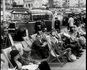 Deckchairs: Men and Women Sitting in Deckchairs on the