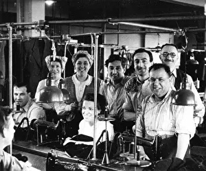 Braces: Men and women in a tailors workshop