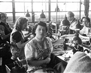 Tailoring: Men and women in a tailors workshop