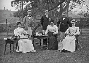 Racquets: Men and women taking tea in a garden