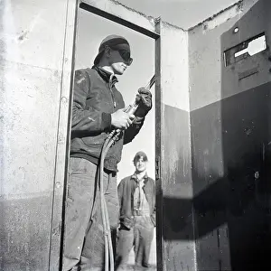 A Flying History - Peter Keating Aviation Collection: Men at work on bomb-damaged house