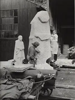 Sculptors: Men working on Baden Powell statue