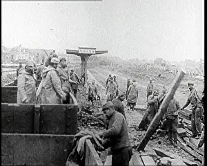 Noyon: Men Working to Clean Up and Repair the Noyon