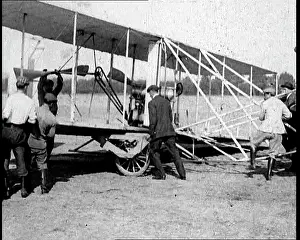 Kitty: Men Working To Raise An Early Wright Brothers