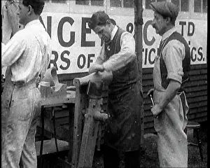 Prosthetic: Men at a Workshop Crafting and Carving Prosthetic Legs