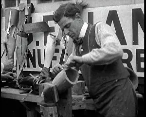 Prosthetic: Men at a Workshop Crafting and Carving Prosthetic Legs
