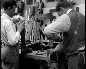Prosthetic: Men at a Workshop Crafting and Carving Prosthetic Legs