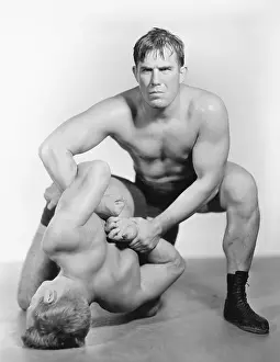 Workout: Two men wrestling with each other