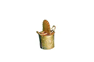 Snuff: Merry, Phipson & Parker shell candle holder and snuffer