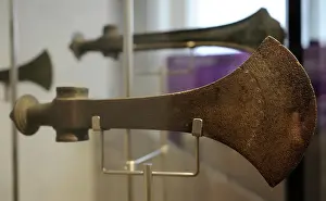 Votive: Metal Age. Cult axe from Ormenaes, Funen. 1500-1300 BC. Mus
