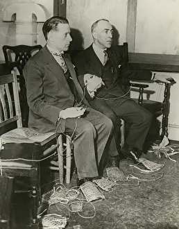 Mediums: The method of linking up hands and feet of sitting mediums