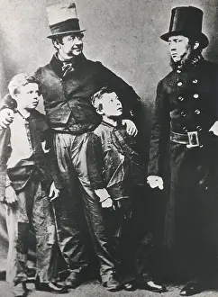 Metropolitan Police officer with man and two boys
