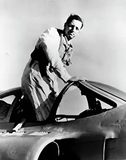 Lithgow: Michael Lithgow climbing out of his plane