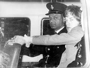 Continuously: Mick Jagger of The Rolling Stones en route to prison