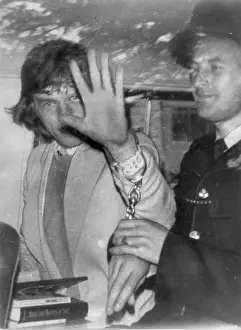 Continuously: Mick Jagger of The Rolling Stones en route to prison