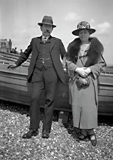 Pebbly: Middle-aged couple on a pebbly beach