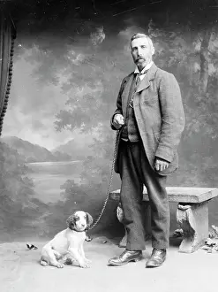 The Roger Worsley Archive: Middle aged man with spaniel puppy, Mid Wales