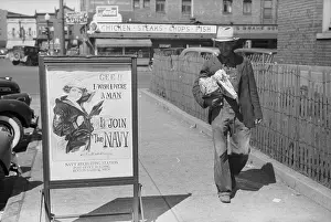 Migrant: Migrant fruit worker from Arkansas walking by the post offic