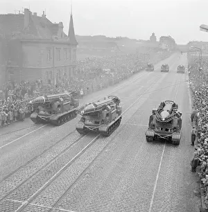 Cobble: Military parade - rocket launchers - fear - medium range