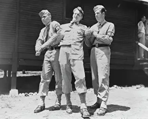 Defending: Military privates practicing a come along hold, circa 1942