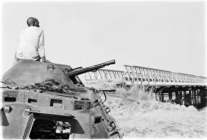 Cuanavale: Military wreckage at the Cuito river bridge from the