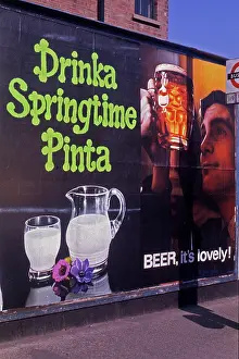 Adjacent: Milk and beer advertisements compete