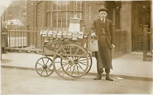 Handcart: Milk boy with three-wheeled cart & cans