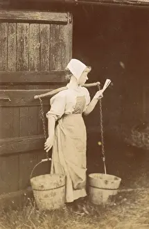 Yoke: A milkmaid carrying two buckets of milk