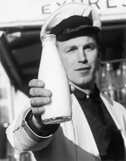 Milkmen: MILKMAN HOLDS BOTTLE
