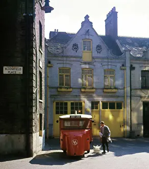 Milkman: Milkman and milk float, London