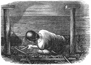 Pick: Miner working a seam with a pick scuffling out