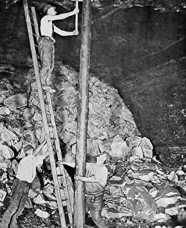 Collier: Miners fitting long pit props Victorian period