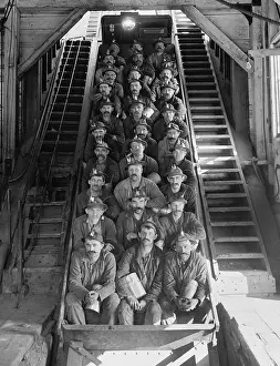 Superintendents: Miners in an open tram at the Calumet and ?