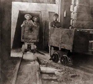 Yielded: Miners pushing ore carts through the tunnels ?