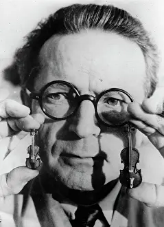 Ebony: Miniature violins