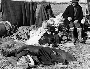 Posessions: A Misouri sharecropper with his three little ?