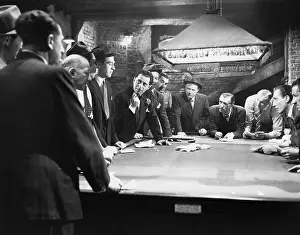 Organize: Mobsters meeting around pool table