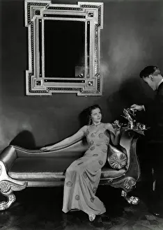 Sandys: Model in beaded sequine evening dress