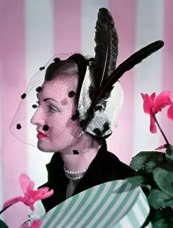 Dotted: Model - cap-style hat with black dotted veil and -feathers
