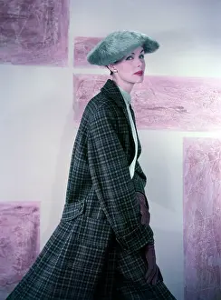 Lips: Model in dark green check swing overcoat