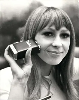 Bigger: Model demonstrates Dynatone facial exerciser, London