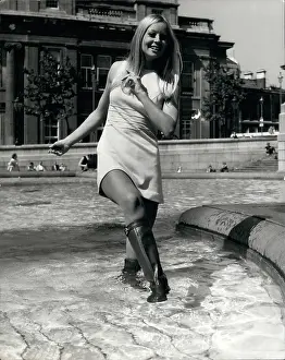 Qualities: Model demonstrates waterproof leather boots, London