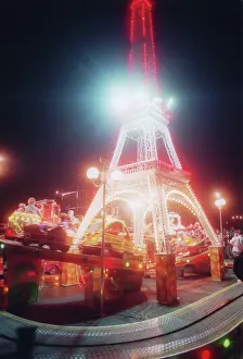 Tiny: Model of Eiffel Tower at firework festival in