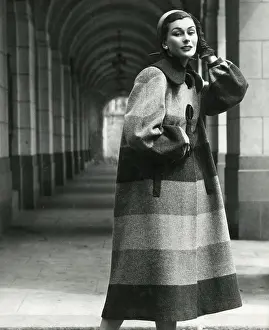 Sophistication: Model in fabulous wide stripe long woollen coat