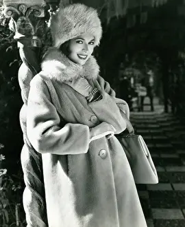 Sandys: Model in outdoor setting with teddy bear coat