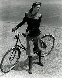 Sandys: Model in outdoor suit - cycling