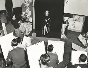 Easels: Model posing for art class