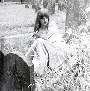 Slim: Model posing in a graveyard